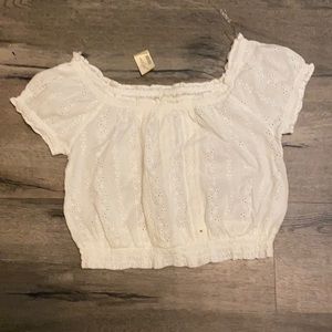 White ruffle crop top with embroidery designs